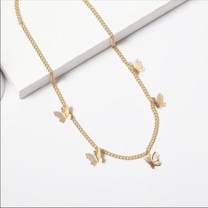 Gold tone butterfly choker necklace 🦋